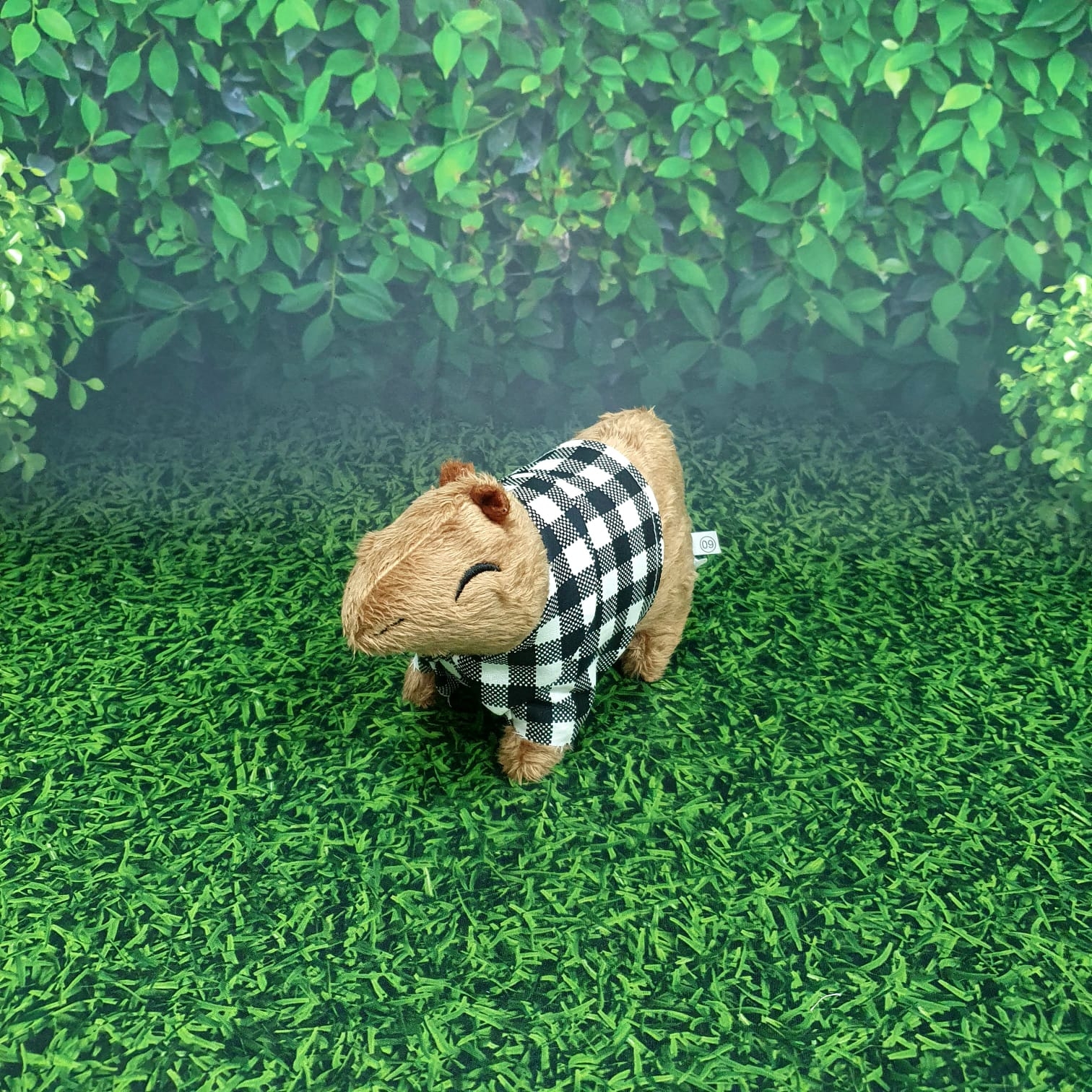 Pelúcia Capivara de casaco