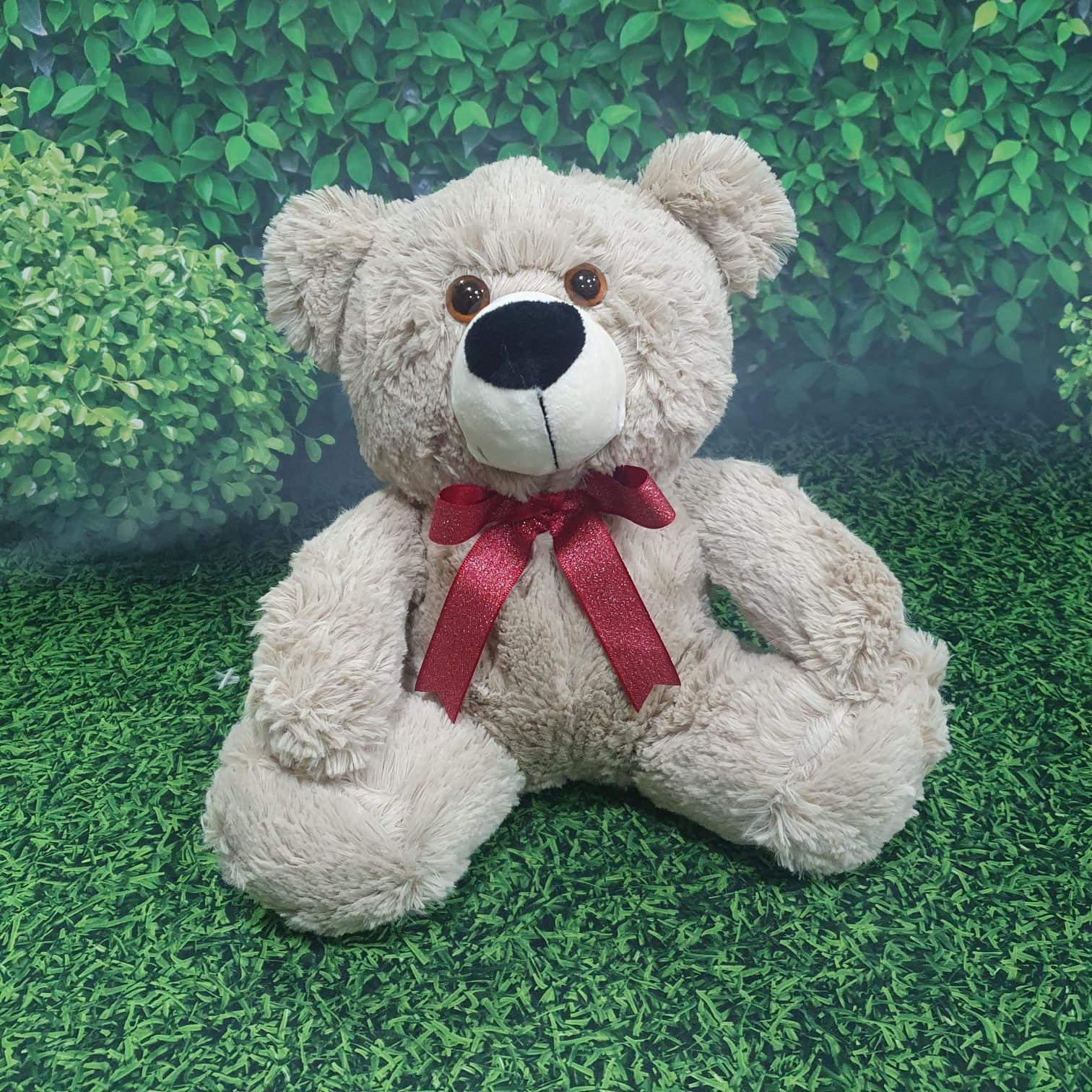 Pelúcia urso com laço